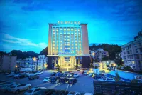 QING LV INTERNATIONAL HOTEL Hotels near Ming Paradise