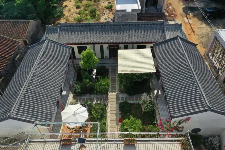 Xuwen Sihe Tingyuan Homestay (Shanhuguan Tourism Area) Отели рядом с достопримечательностью «Denglou Cape»