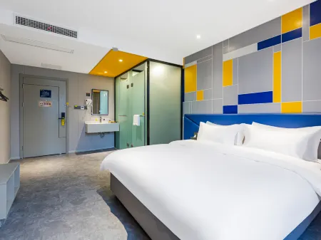 7Days Inn Hotel (Xishui Runda Xinhua Zhengjie) Отели в г. Сишуй