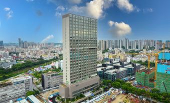 Bosideng Executive Apartment (Shenzhen Bantian Metro Station Wanzhi Building)