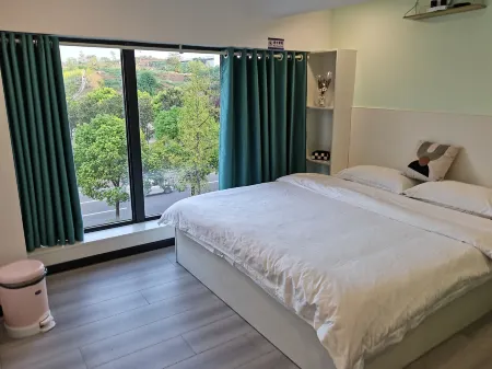 Two plus three guesthouses Отели рядом с достопримечательностью «Chongqing Telecommunication Vocational Institute»