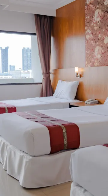 ห้องดีลักซ์สำหรับสามท่านพร้อมระเบียง