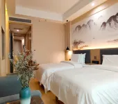 Yunduo Qingyu Hotel (Xingguo Railway Station Branch)