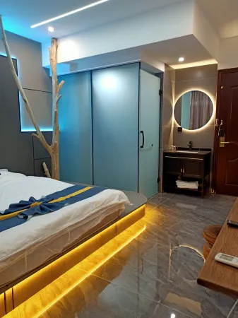 Julongge Отели рядом с достопримечательностью «Shiwei Peak»