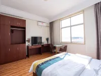 Qixinda Business Hotel (Jiaozhou Bus Terminal Shop)