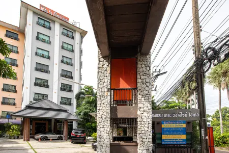 The Wing Design Hotel Отели рядом с достопримечательностью «Wat Suan Mokkh»