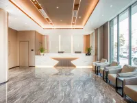 GEM Hotel (Xinyang Xi County Longhu Central City Wuyi Road) โรงแรมในซีเซียน