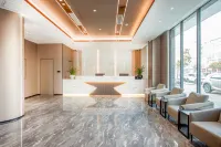 GEM Hotel (Xinyang Xi County Longhu Central City Wuyi Road)