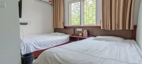 Jianmenguan Guoping Homestay