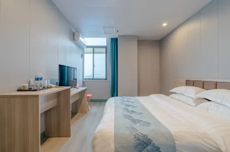 Qingnian Boutique Hotel（FeiDong longtang shuilishuidian dian） Отели в г. Фэйдун