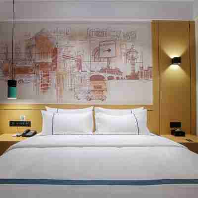 城市便捷酒店（廉江大道鑫源國際廣場店） Rooms