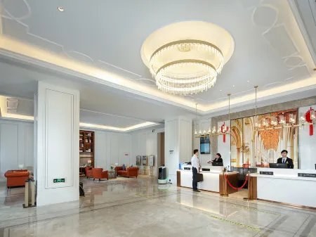 VIenna International Hotel (chongqing tongliang wanda plaza store) Отели рядом с достопримечательностью «Chongqing Vocational College of Art and Engineering»