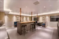 Lanhai Business Hotel (Yongcheng Zhongxin Bus Station Municipal Government)