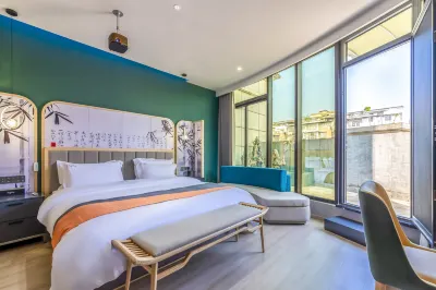 洪雅院裡院外飯店（客運站中心縣政府店） 義大利卡百利藝術塗料·軟裝附近的飯店