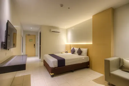 OYO 1066 Dorotello Apartelle Отели в г. Кейнта