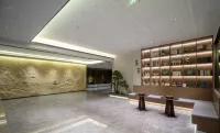 QIANNA HOTEL GLORIOUS(Xinyang High Speed Railway East Station） Hotels in Xinyang