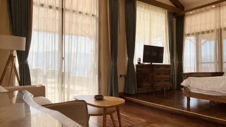 Tinghuatang Seaview Garden Inn Отели рядом с достопримечательностью «Dazu Pier»