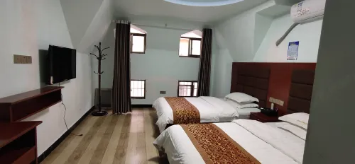 Qingzhen Jiaxin Business Hotel