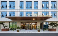 Hanzhong Central Square High Speed Railway Station Renjoy Hotel Hotel in zona Ancient Hutou Bridge