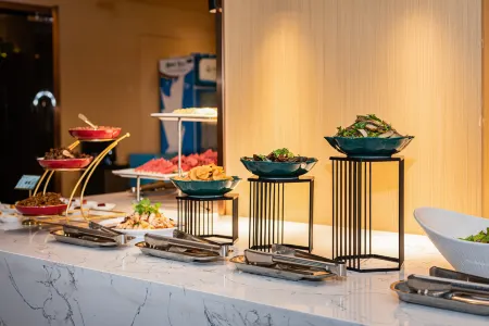 Suqian Rezen Manxiang Hotel Отели рядом с достопримечательностью «Baolong 24Th Street»