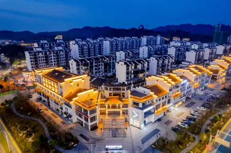 Jindu Meiju Hotel (Wuyuan High-Speed Railway Station) Отели в г. Уюань