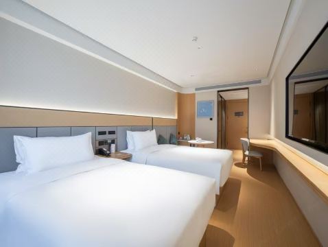 JI 호텔 (중일 우의병원)의 깔끔한 객실 이미지