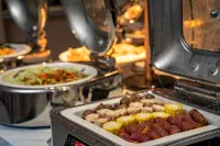Chufan River View Hotel (Xishuangbanna Jinghong Gaozhuang Xishuangjing Star Night Market) - sarapan