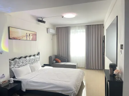 Quanzhou Four Seasons Film Lnn Отели рядом с достопримечательностью «Quangang Botanical Garden»