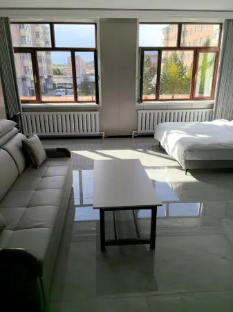 Naonao Business Hotel Отели в г. Тахэ