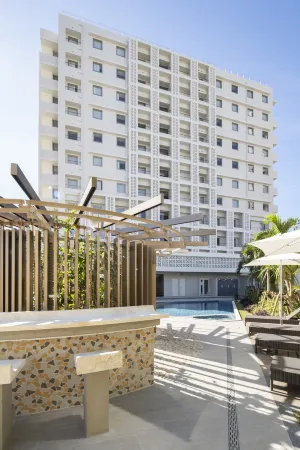 Okinawa Hinode Resort and Hot Spring Hotel Отели рядом с достопримечательностью «Shuri Ryusen»