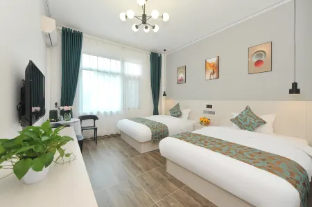 Dongxing Wanwei Encounter Inn Отели рядом с достопримечательностью «Wanwei Golden Beach»