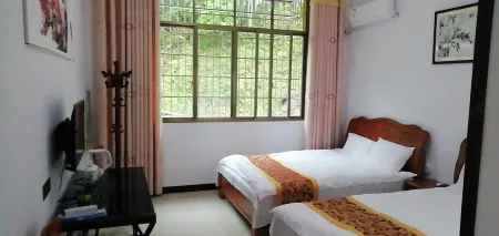 Jinggangshan Bajiaolou Inn Отели рядом с достопримечательностью «Octagon House»