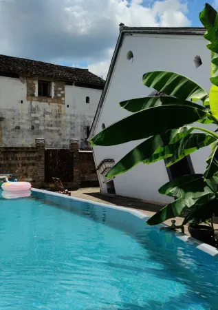 Y Art bnb Отели рядом с достопримечательностью «Guzhang Folklore Garden»