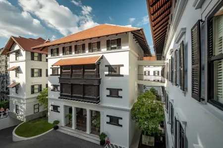Bella Nara Hotel Chiang Mai Отели рядом с достопримечательностью «Roitawarabarn Baandhawalai - Porter house»