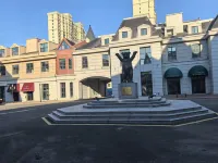 楓驛輕奢民宿（哈爾濱世界歡樂城店） 哈爾濱華德學院附近的飯店