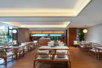 Moshang Qingya Hot Spring Hotel (Tengchong Main Urban Area Wenxing Building) - พร้อมอาหารเช้า
