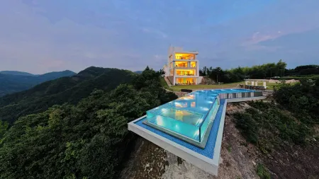 Floral Lux Hotel·Pan'an Panshan yunyin Guesthouse Отели рядом с достопримечательностью «Zhaomingyuan Scenic Area»