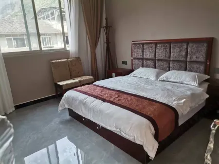 Xiyangyang Business Hotel Baoxing Отели рядом с достопримечательностью «Hongjun Changzheng Fanyue Jiajin Mountain Memorial Hall»