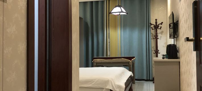 Woxin Hotel โรงแรมในผอหยาง