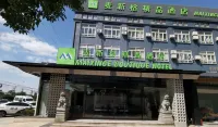 麥新格精品飯店（上海周浦萬達繁榮路地鐵站店） 裘天寶銀樓(康沈路店)附近的飯店