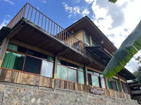 Lancang Yujian Jingmai No. 46 Homestay Отели рядом с достопримечательностью «The Old Bulang Ethnicity Village of Wenji»