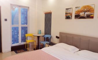 Yanji Songzi Apartment (Yanbian University Network Red Wall Shop)