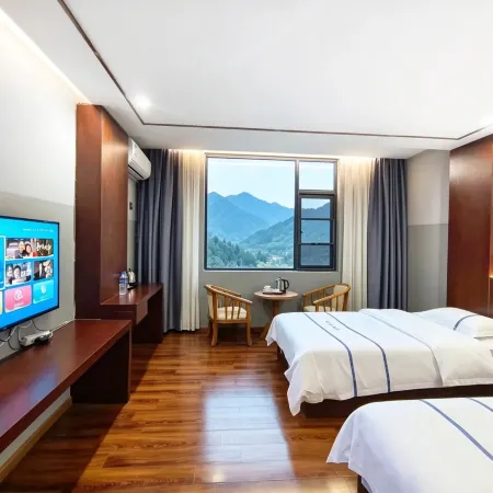 Mojiang XinXing Business Hotel