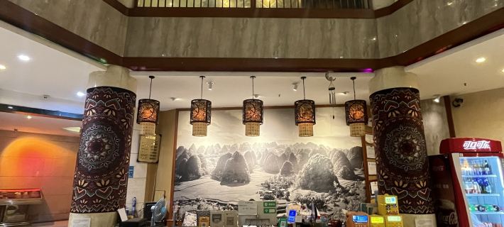 Shuimo Landscape Grand Hotel (Xingyi Railway Station) Отели в г. Синъи