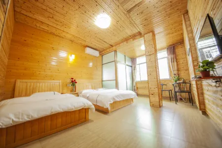 Huanxing Inn Отели рядом с достопримечательностью «Yongding Ancient Town»