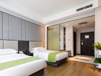 橙子酒店(西安高新绿地笔克会展中心店) - 阳光双床房