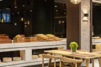 The GiorgioMorandi Hotels F (Qufu's Temple and Cemetery of Confucius and Kong Family Mansion) - Desayuno