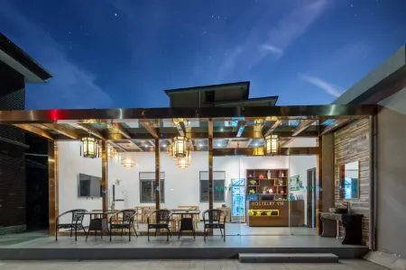 Yueman Inn Отели рядом с достопримечательностью «Siming Lake»