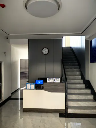 Junan County Shiguang Apartment Отели в г. Цзюйнань