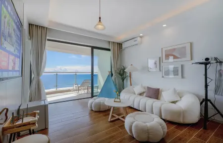 Haolang Apartment (Wuchuan Dinglongwan Ocean Kingdom) Отели рядом с достопримечательностью «Dinglong Bay Sea Corner»